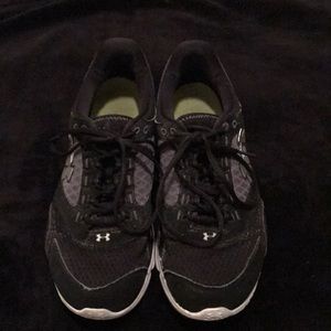 Black and grey Under Armour shoes